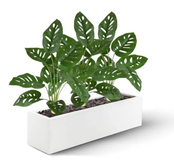 Moderne werkruimte met kunstplanten die zorgen voor een nette, duurzame en uitnodigende kantooromgeving.