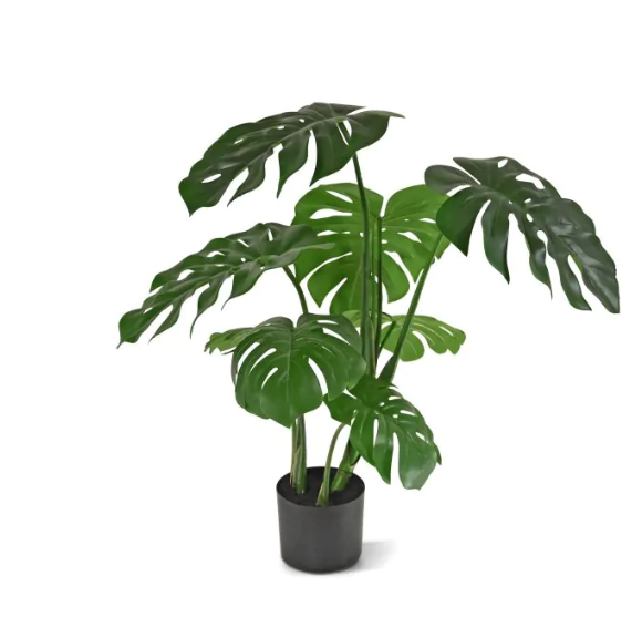 Moderne werkruimte met kunstplanten die zorgen voor een nette, duurzame en uitnodigende kantooromgeving.