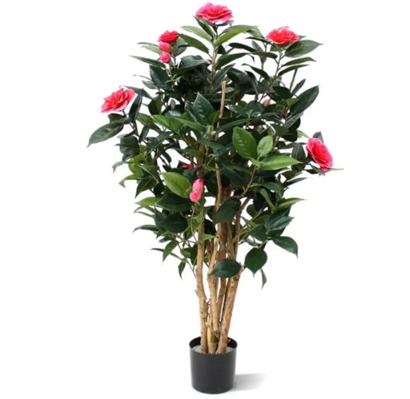 Moderne werkruimte met kunstplanten die zorgen voor een nette, duurzame en uitnodigende kantooromgeving.