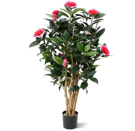 Moderne werkruimte met kunstplanten die zorgen voor een nette, duurzame en uitnodigende kantooromgeving.