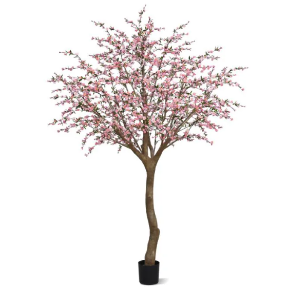 Moderne werkruimte met kunstplanten die zorgen voor een nette, duurzame en uitnodigende kantooromgeving.