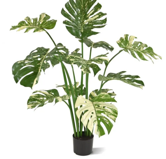 Moderne werkruimte met kunstplanten die zorgen voor een nette, duurzame en uitnodigende kantooromgeving.